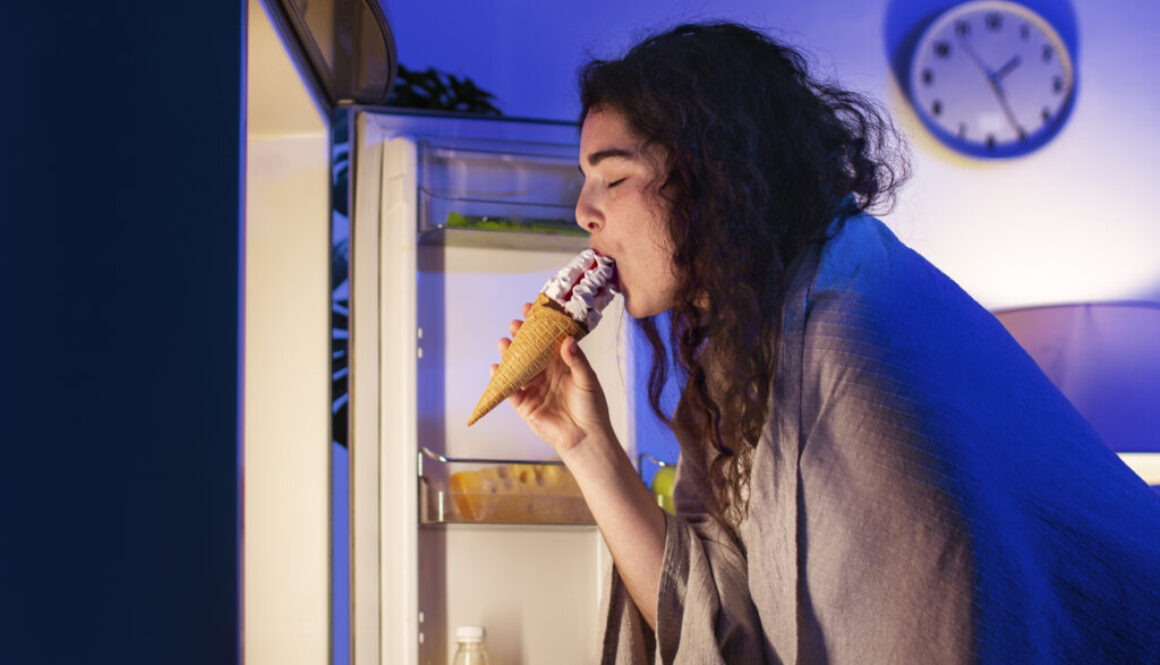 side-view-woman-eating-ice-cream